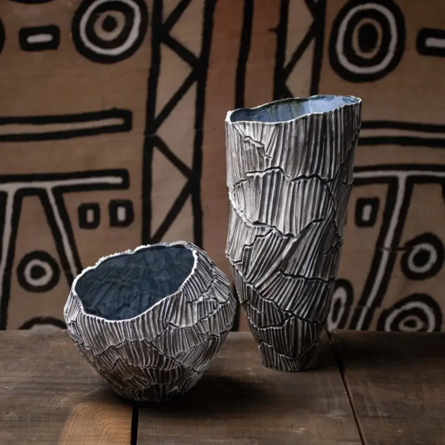 Exceptional FOS Ceramiche Zefiro Rock vase sculpted from pure white porcelain with roughly textured surface and subtle grey coloration