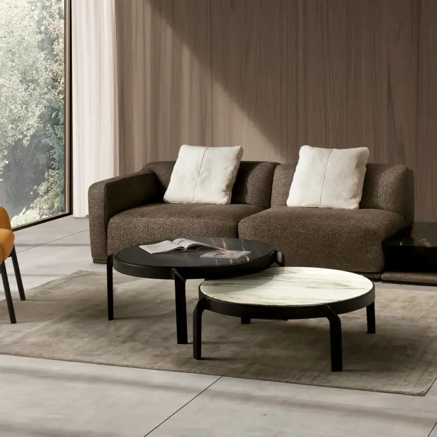 Elegant CTS Salotti Tape coffee table with a curved solid wood frame and contrasting dark glossy with white veined marbled surfaces