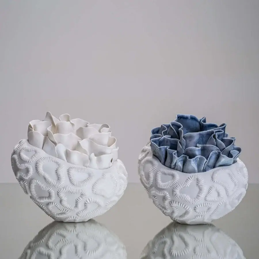 Elegant FOS Ceramiche Antholia Blue vase handcrafted in white biscuit porcelain with nuanced blue tones and textured base