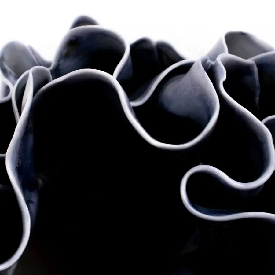 Superior FOS Ceramiche Antholia Blue vase crafted in white biscuit porcelain with a glazed interior and textured exterior