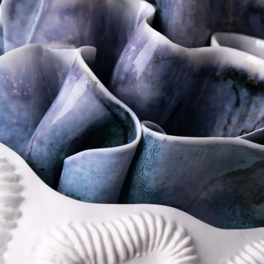 Captivating FOS Ceramiche Antholia Blue vase crafted in white biscuit porcelain with a nuanced gradient and layered petal-like forms