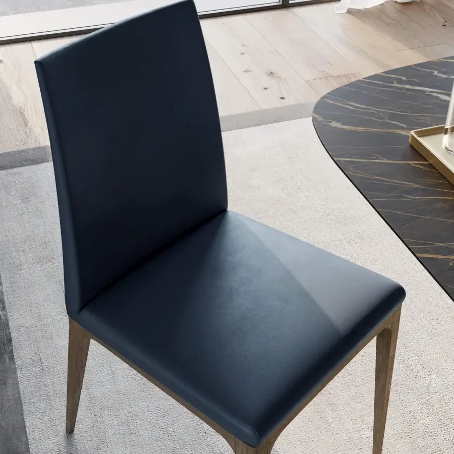 Remarkable Dallagnese Wendy chair with dark navy blue fabric upholstery and satin tone tapered legs