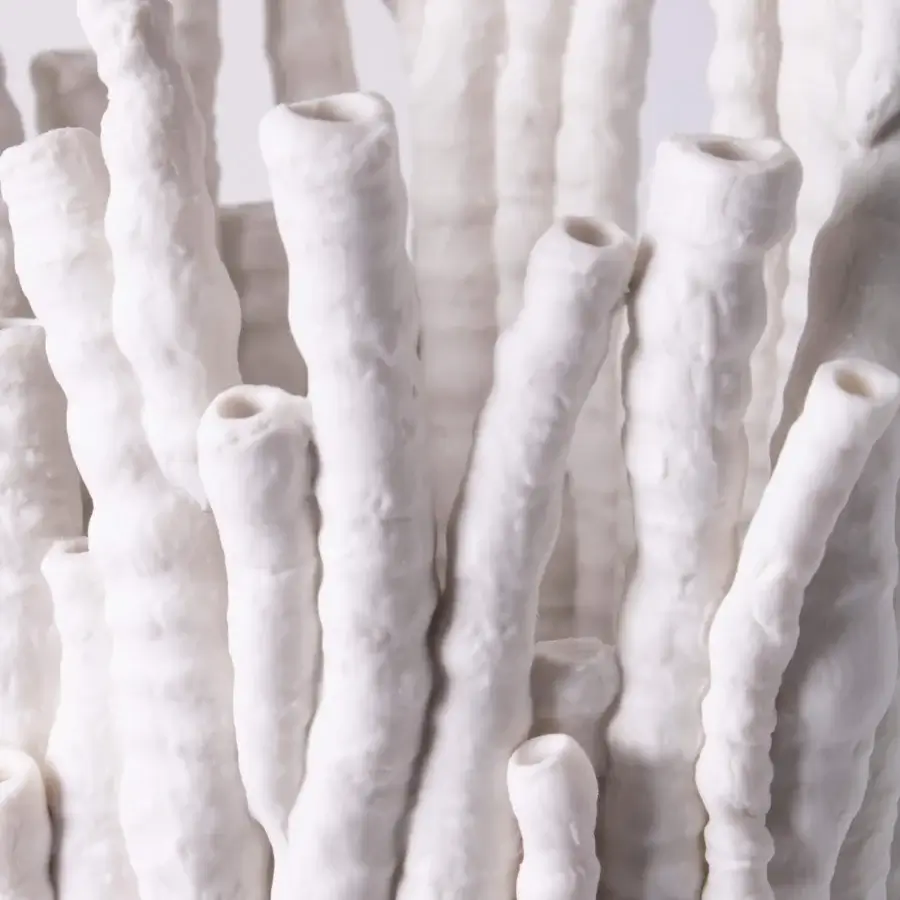 Distinguished FOS Ceramiche Akanthos vase handcrafted in white biscuit porcelain with a subtly textured matte finish