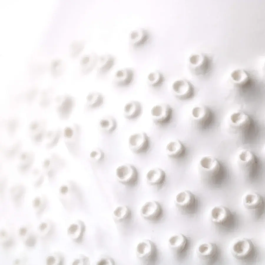 Luxury FOS Ceramiche Oceania white vase handcrafted in Italian porcelain with evocative metal oxides and a refined matte finish