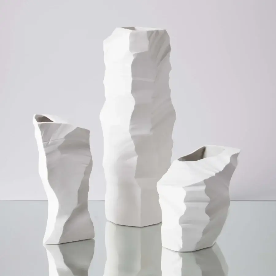 Exceptional FOS Ceramiche Artika vase set sculpted from precious porcelain with a bright white matte finish and fractured texture
