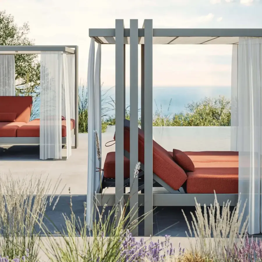 Exceptional MY YOUR Soletto daybed with reddish-orange textured upholstery and aluminum frame built for outdoor relaxation