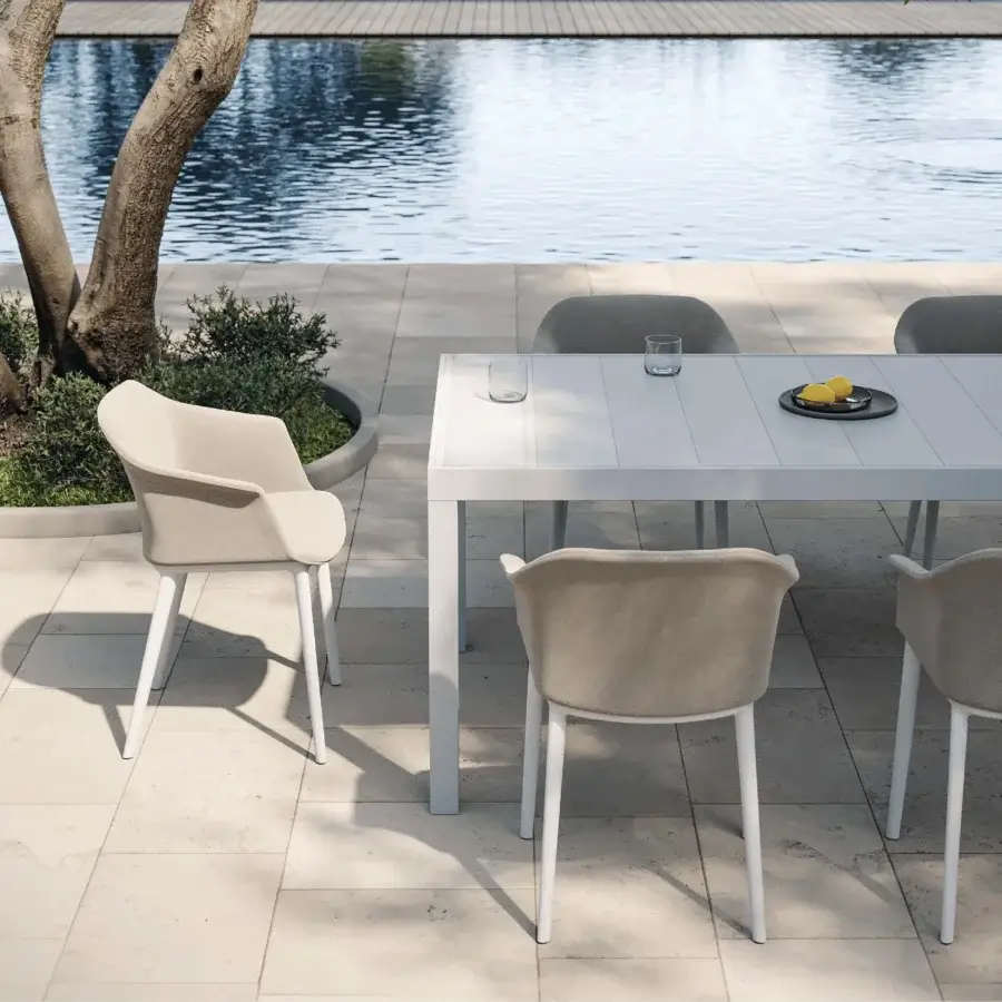 Exceptional MY YOUR Italian Outdoor Experience armchair with gently curved form in muted beige polypropylene upholstery and smooth matte finish