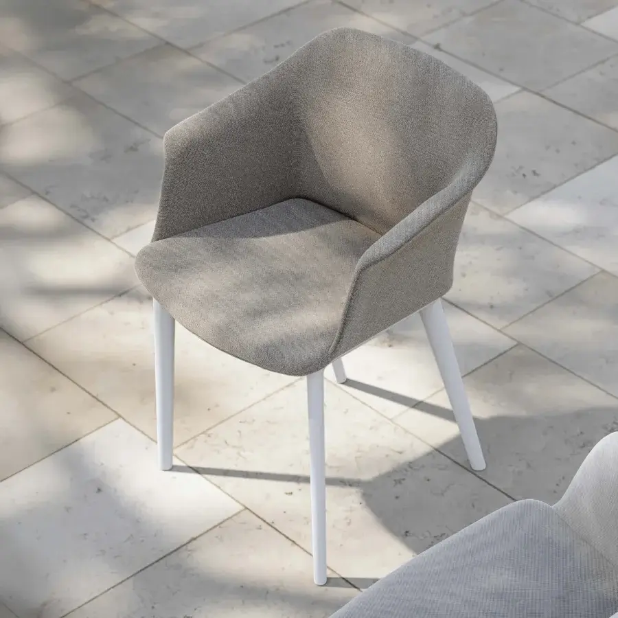 Superior MY YOUR Italian Outdoor Experience armchair crafted from polypropylene with neutral beige textile upholstery and sleek white metal legs