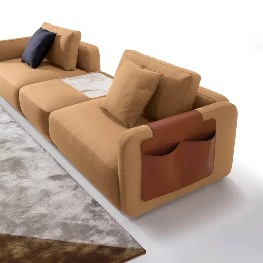Distinguished CTS Salotti Kant sectional built with golden-tan textile and reddish-brown leather accents with black ABS feet