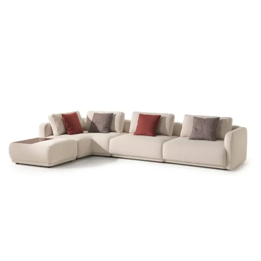 Distinguished CTS Salotti Kant sectional upholstered in subtly textured neutral beige fabric with rounded edges and terracotta accent pillows