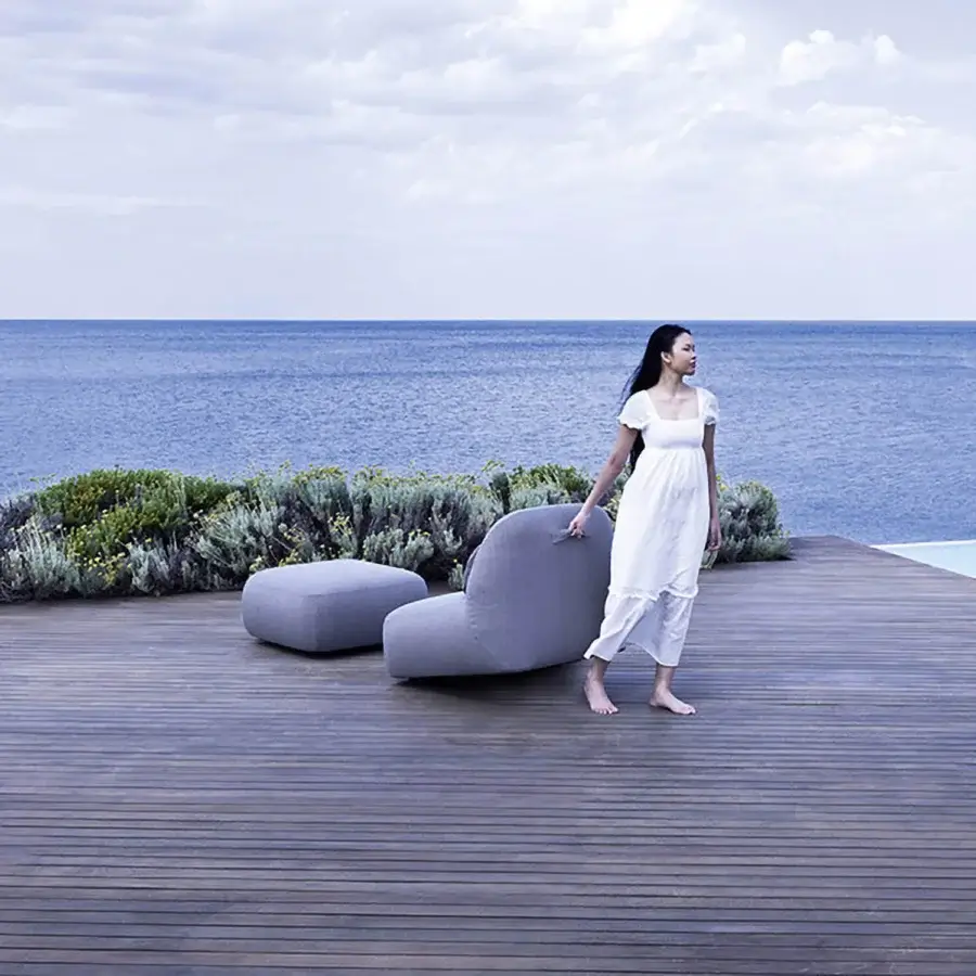 Exceptional Varaschin Reuse outdoor sofa crafted with okumè wood and textured hemp fabric in a muted gray tone