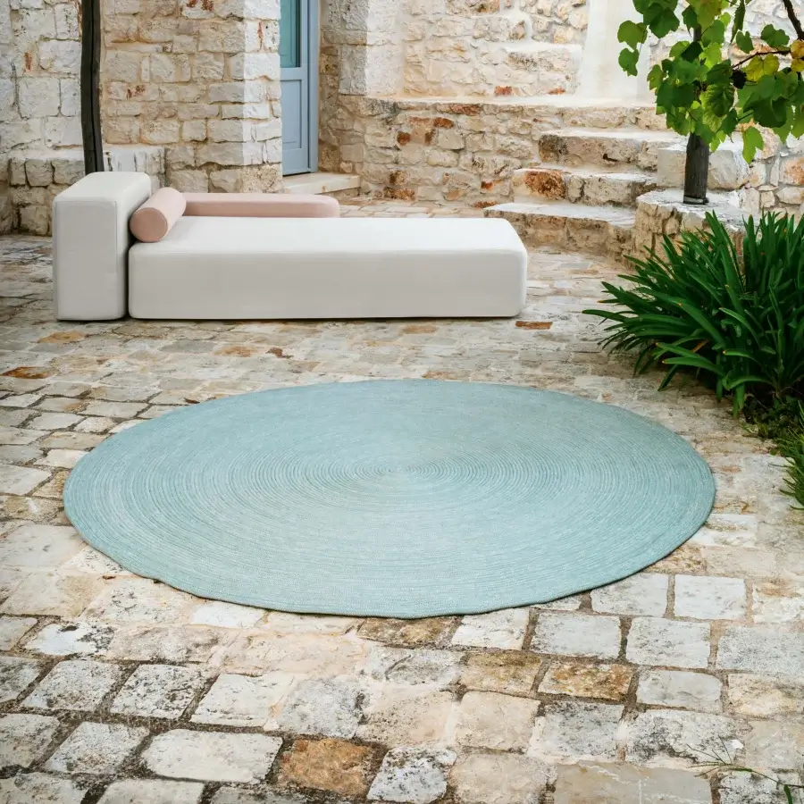 Exceptional MY YOUR Aladdin rug hand-sewn from durable rope with elegant concentric detailing in light blue-green