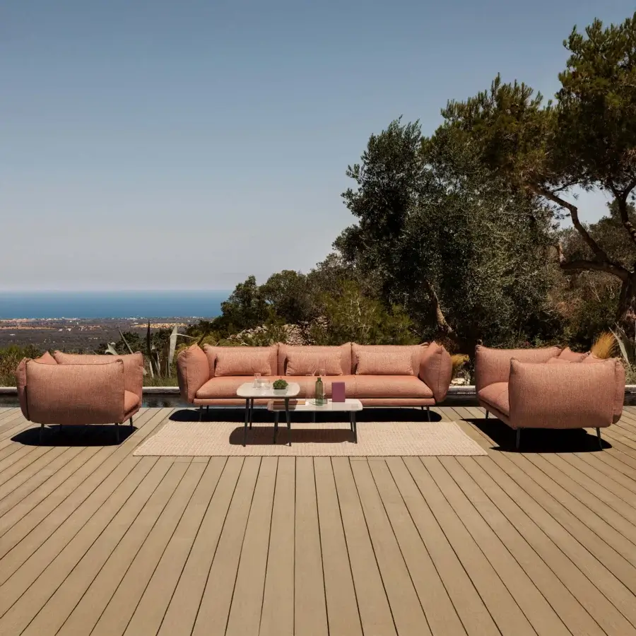 Exceptional MY YOUR Piuma lounge chair with aluminum structure and muted coral outdoor fabric upholstery offering a heathered texture