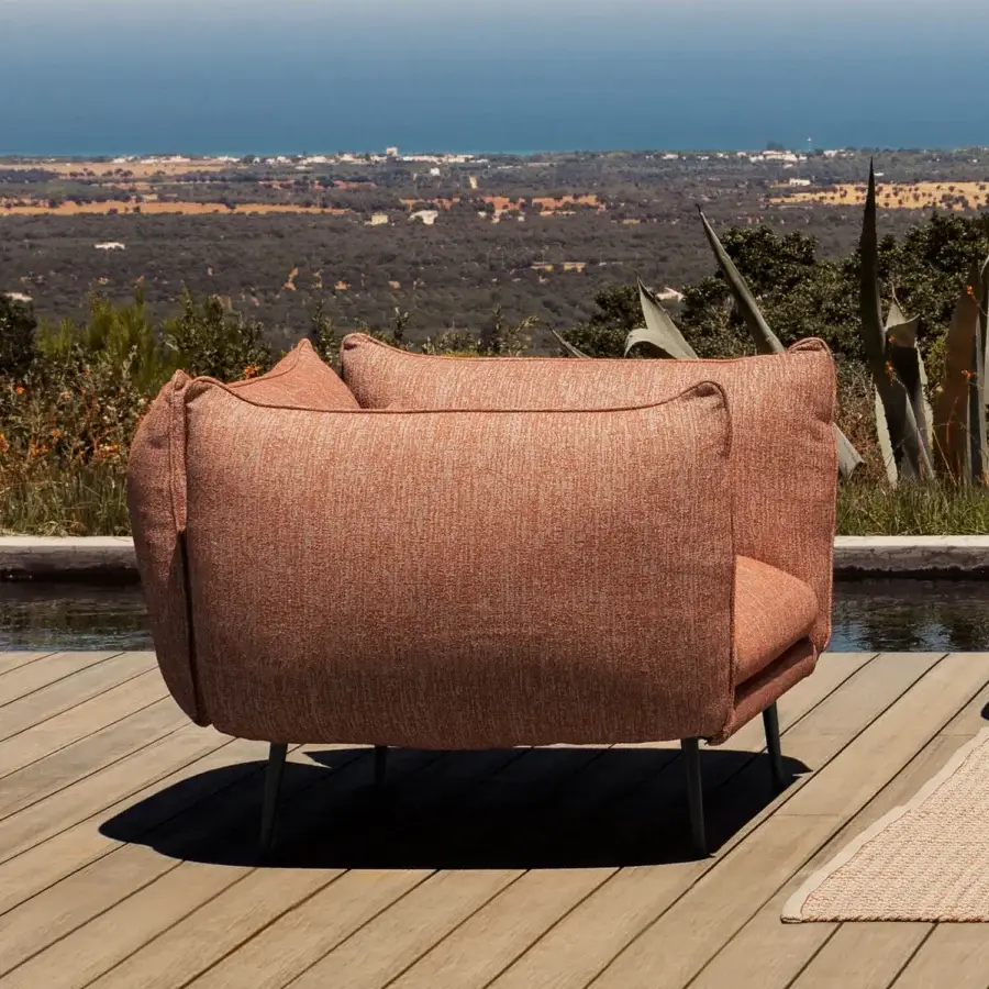 Superior MY YOUR Piuma lounge chair crafted with aluminum and durable outdoor fabric in a muted terracotta tone with highlighted stitching