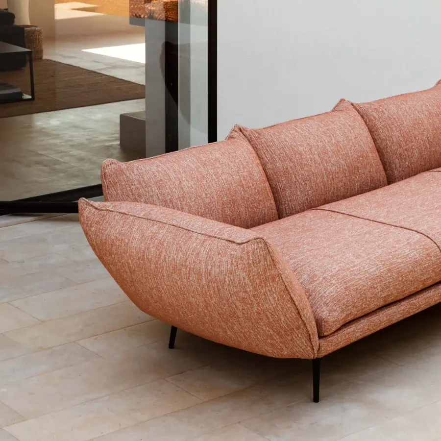 Elegant MY YOUR Piuma sofa with terracotta textured outdoor fabric upholstery and visually floating aluminum structure