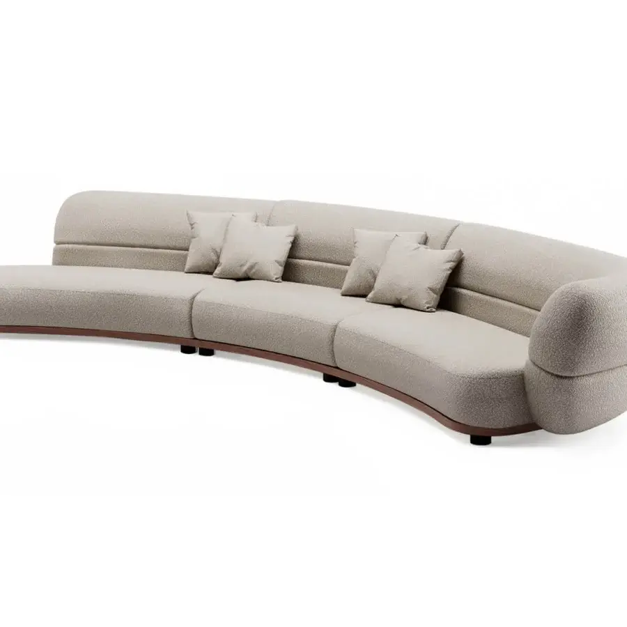 Elegant Shake Vogue sofa with curved form upholstered in luxurious light beige fabric and varnished steel legs