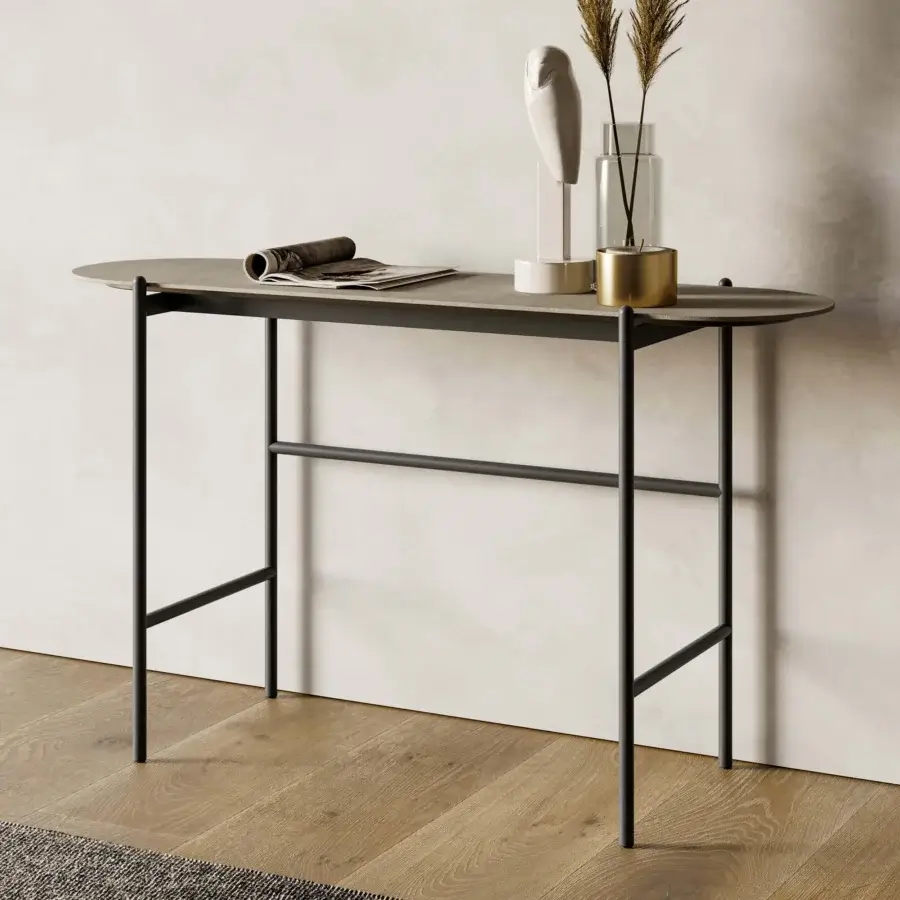 Elegant Dallagnese Supernova console with gently curved muted gray stoneware top and sleek black metal frame exhibiting a matte finish