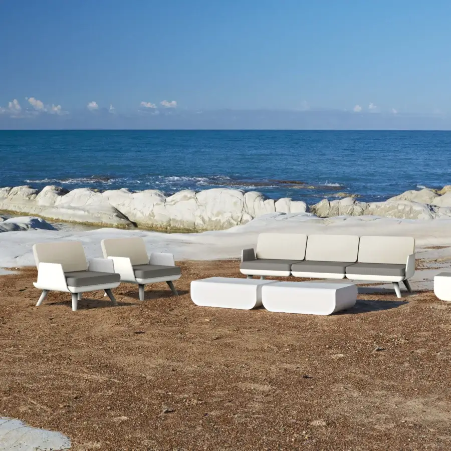 Distinguished MY YOUR Samurai lounge chair with a geometric white frame and comfortable beige cushion crafted in recyclable Poleasy® modules