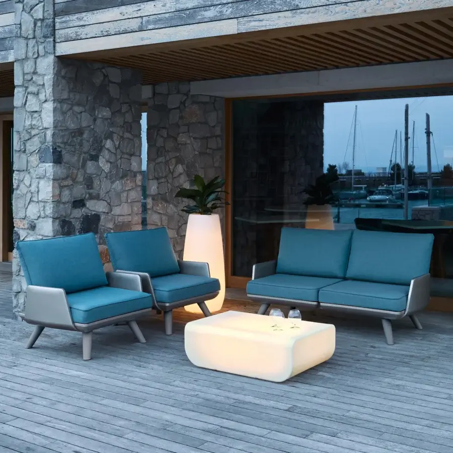 Sophisticated MY YOUR Samurai lounge chair crafted with water-repellent outdoor fabrics and a durable Poleasy® structural basis in muted teal blue