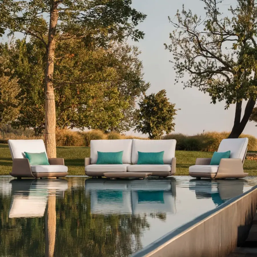 Exceptional MY YOUR Samurai lounge chair crafted with a Poleasy® basis and light beige water-repellent fabrics with teal cushions