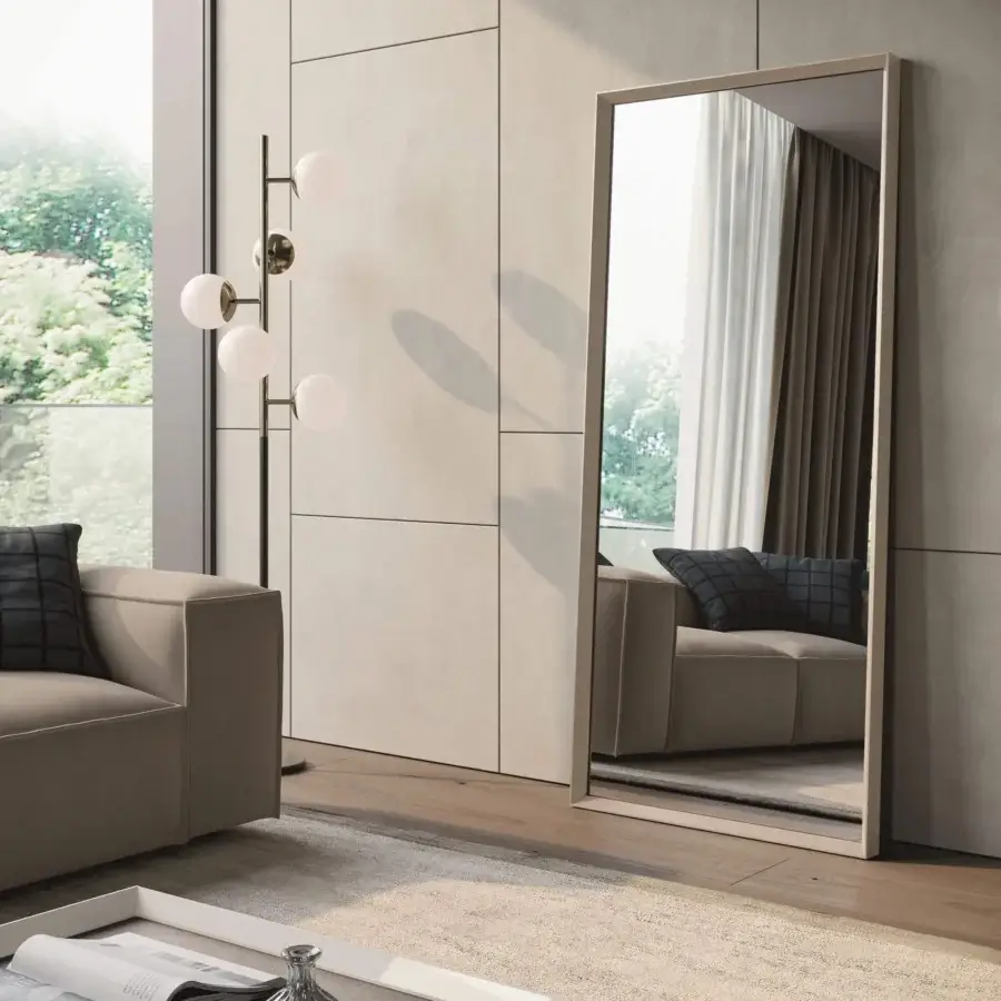 Elegant Dallagnese Slash Mirror with a slender wooden frame and matte neutral beige finish at a 45° angled junction