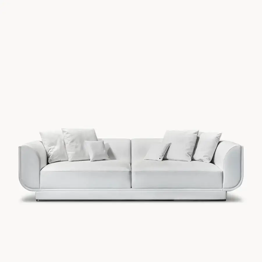 Distinctive Visionnaire Foster sofa with neutral gray textile upholstery, curved silhouette and metal-clad plinth base