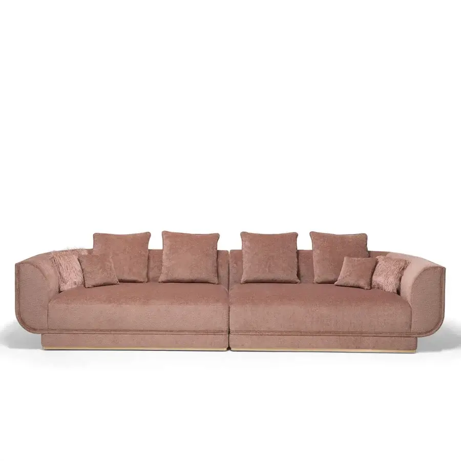 Superior Visionnaire Foster sofa with muted rose textile upholstery, curved volumes and matte finish