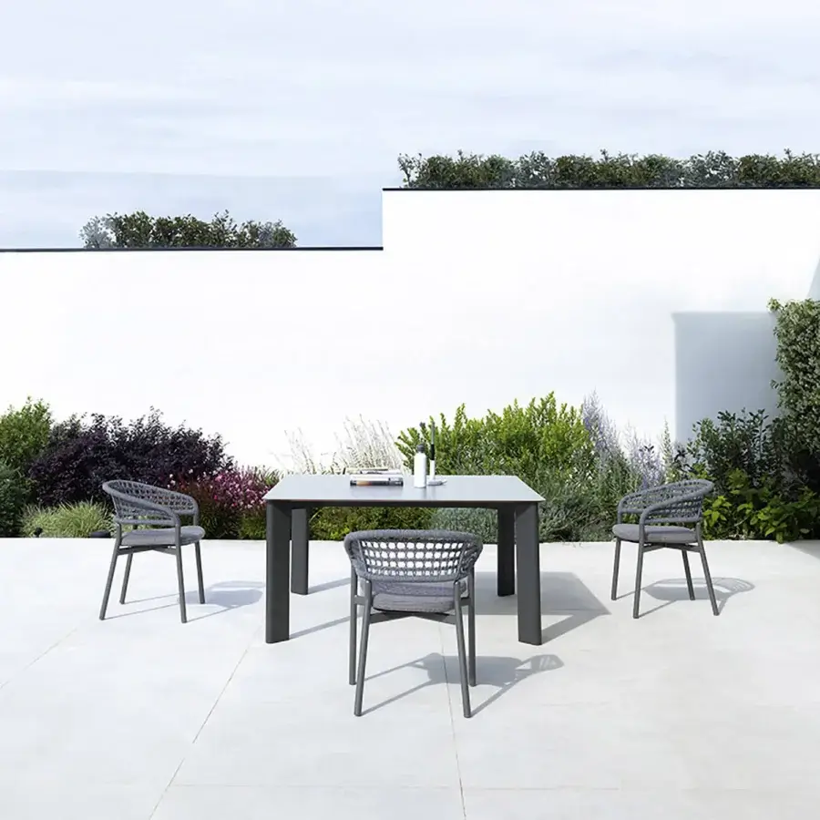 Exceptional Varaschin Plinto dining armchair with woven seat crafted from powder-coated aluminum tube in dark grey with matte finish