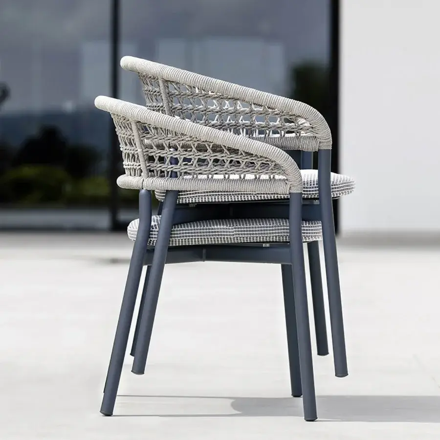 Distinguished Varaschin Plinto dining armchair with a gray rope seat and striped cushion in a matte gray powder-coated aluminum frame