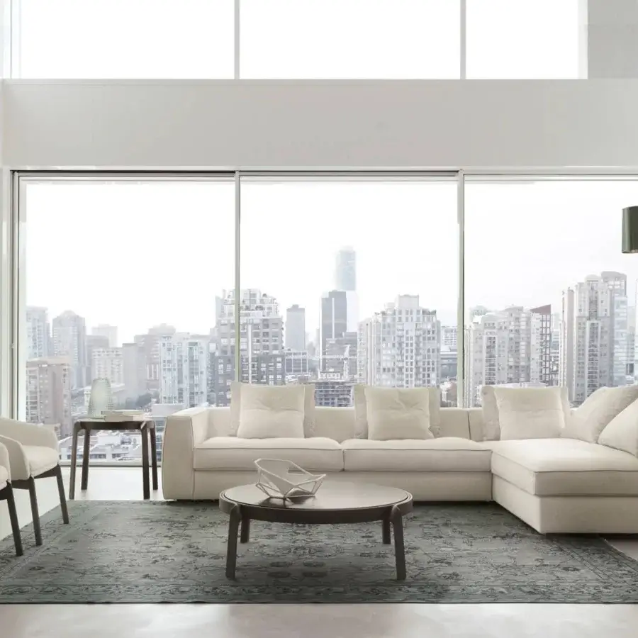 Distinguished CTS Salotti Guest Lounge chair upholstered in soft off-white velveteen with a stained ash sculptural base