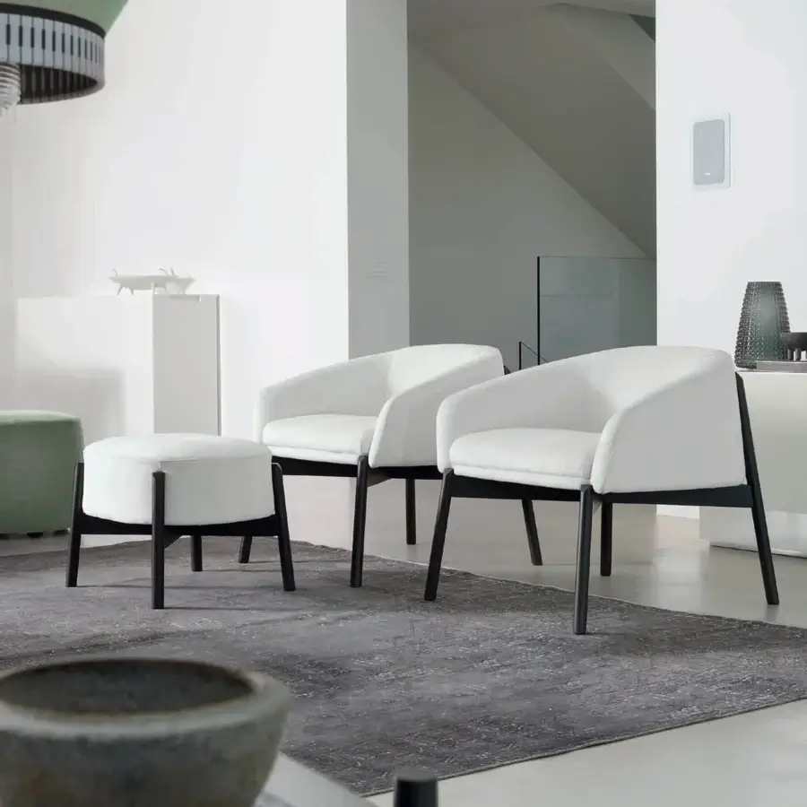 Elegant CTS Salotti Guest Lounge Chair upholstered in light beige velveteen with a stained ash sculptural base