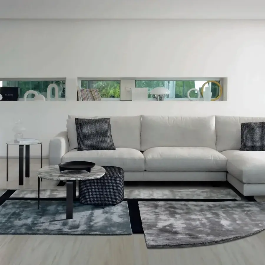 Exceptional CTS Salotti Allure coffee table crafted in mottled gray and white polished marble with a dark gray textured cylindrical base