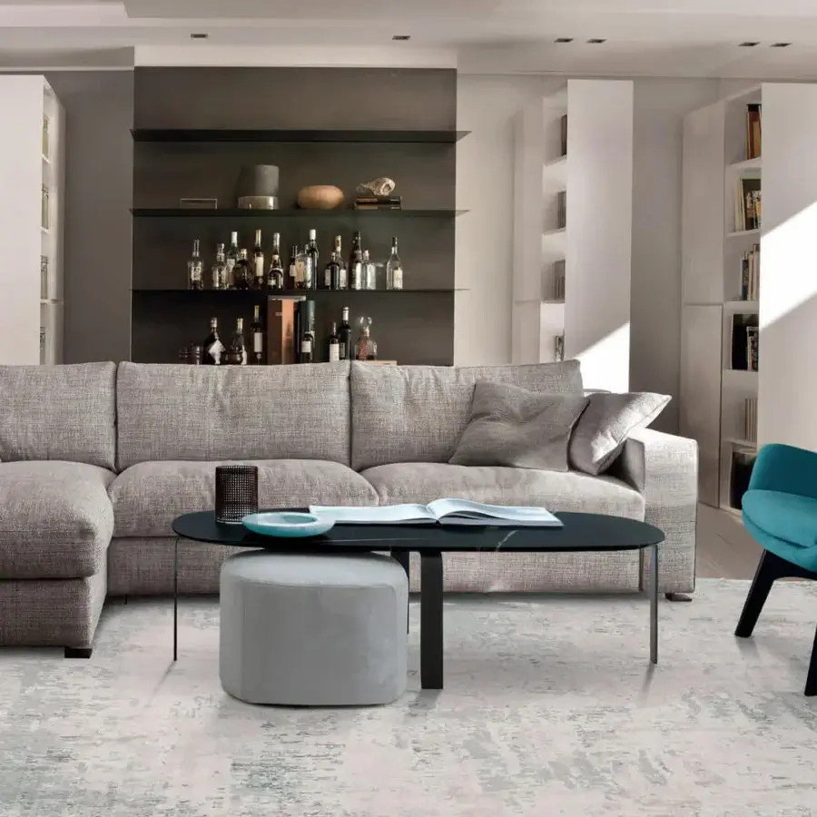 Distinguished CTS Salotti Allure coffee table with dark marble top and dark metal pedestal base in a matte finish