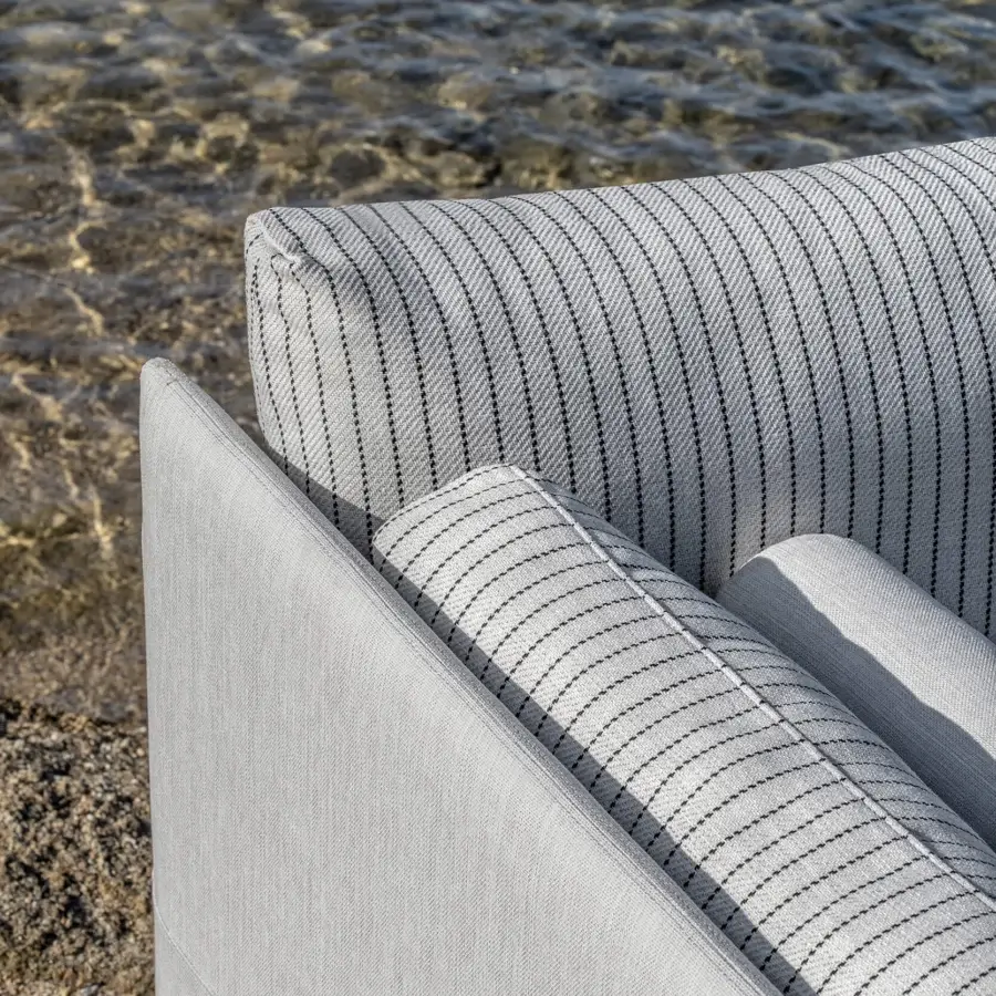 Exceptional Ethimo Baia daybed crafted with striped fabric upholstery offering comfortable cushions and a low profile