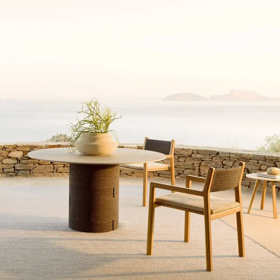 Distinguished Varaschin Gianna dining armchair crafted in Iroko wood with a Desert finish and woven textile backrest