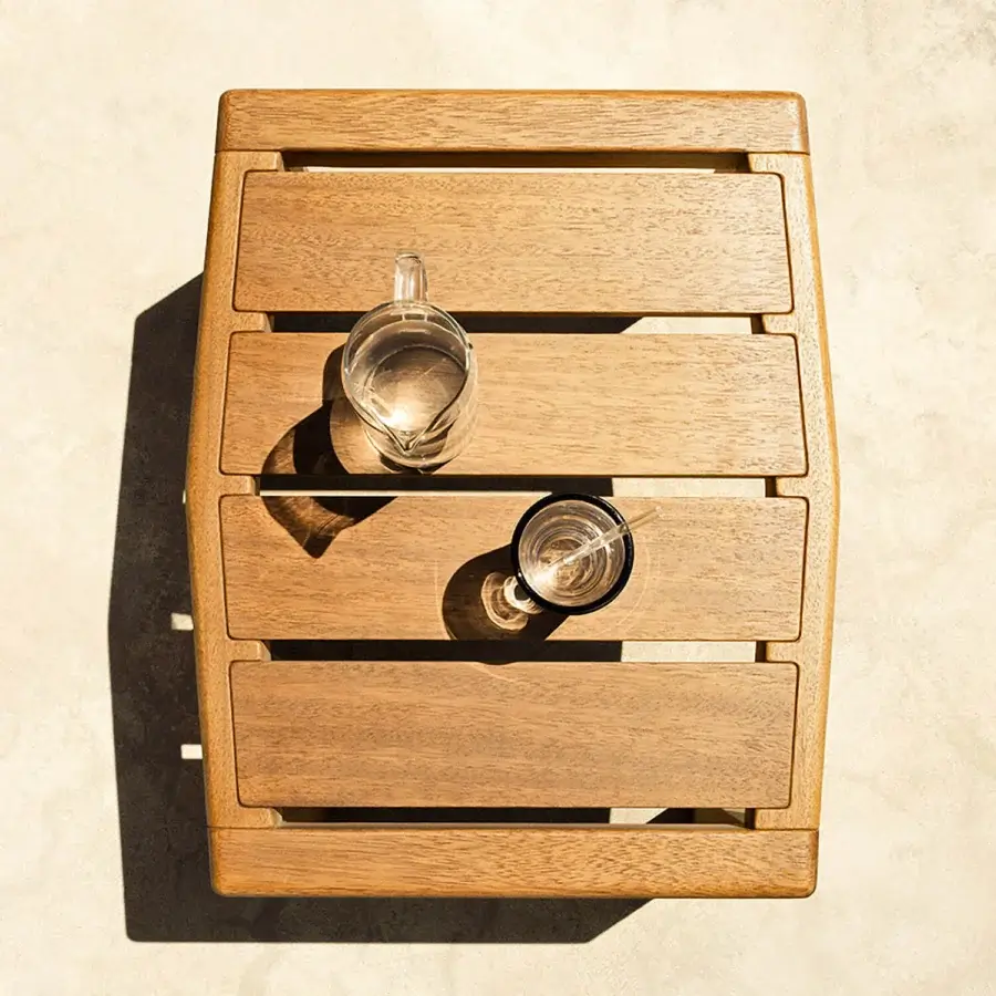 Elegant Varaschin Gianna coffee table built in Iroko wood with a satin finish and warm medium-brown tone