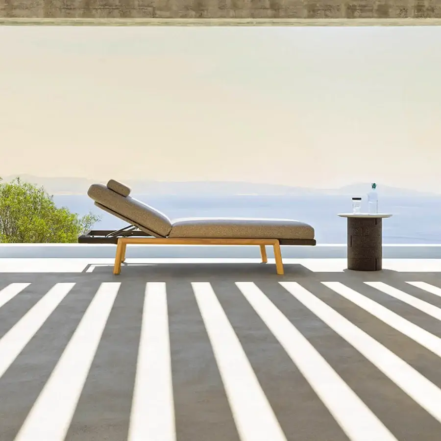 Refined Varaschin Gianna lounger with wheels in muted gray-beige textile and visible Iroko wood accents