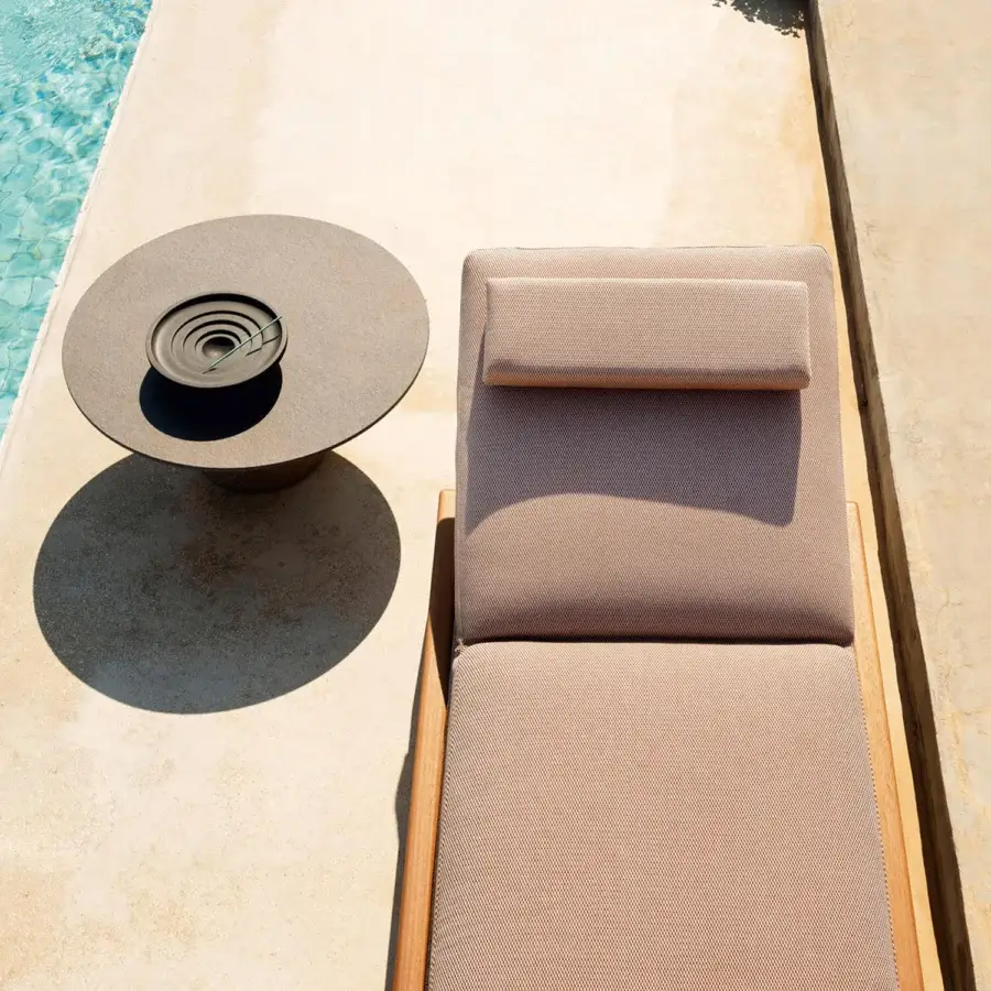 Elegant Varaschin Gianna lounger with wheels in warm beige mat textile and visible Iroko wood accents