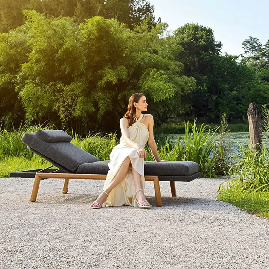 Exceptional Varaschin Gianna lounger with wheels in dark gray textile and visible Iroko wood, built with a smooth finish