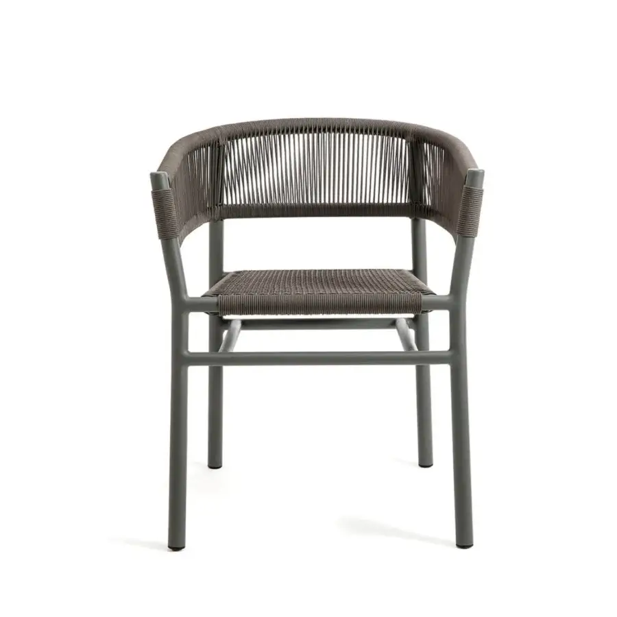 Distinguished Ethimo Kilt armchair with a gently curved silhouette crafted in teak and woven natural fiber