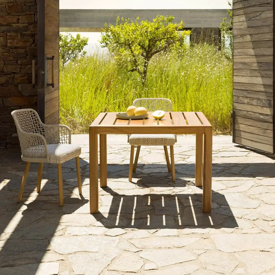 Distinguished Varaschin Gianna dining table crafted in Iroko wood with a satin finish and warm medium-toned brown hue