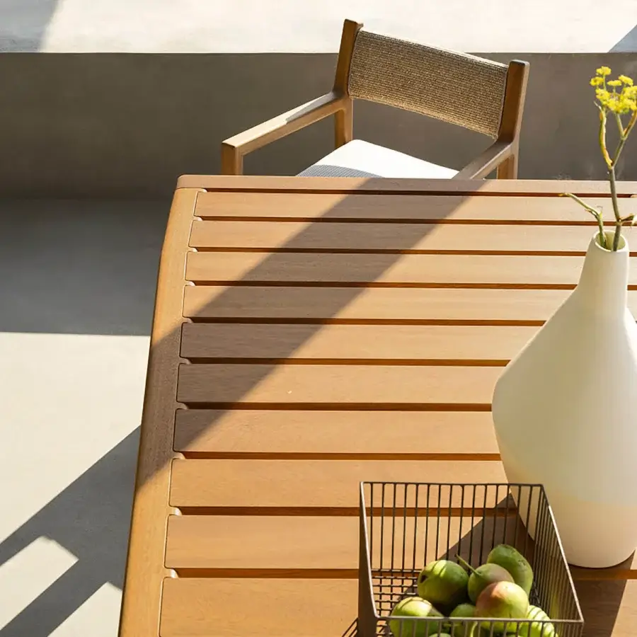 Elegant Varaschin Gianna dining table in Iroko wood with a satin finish and refined rectangular surface