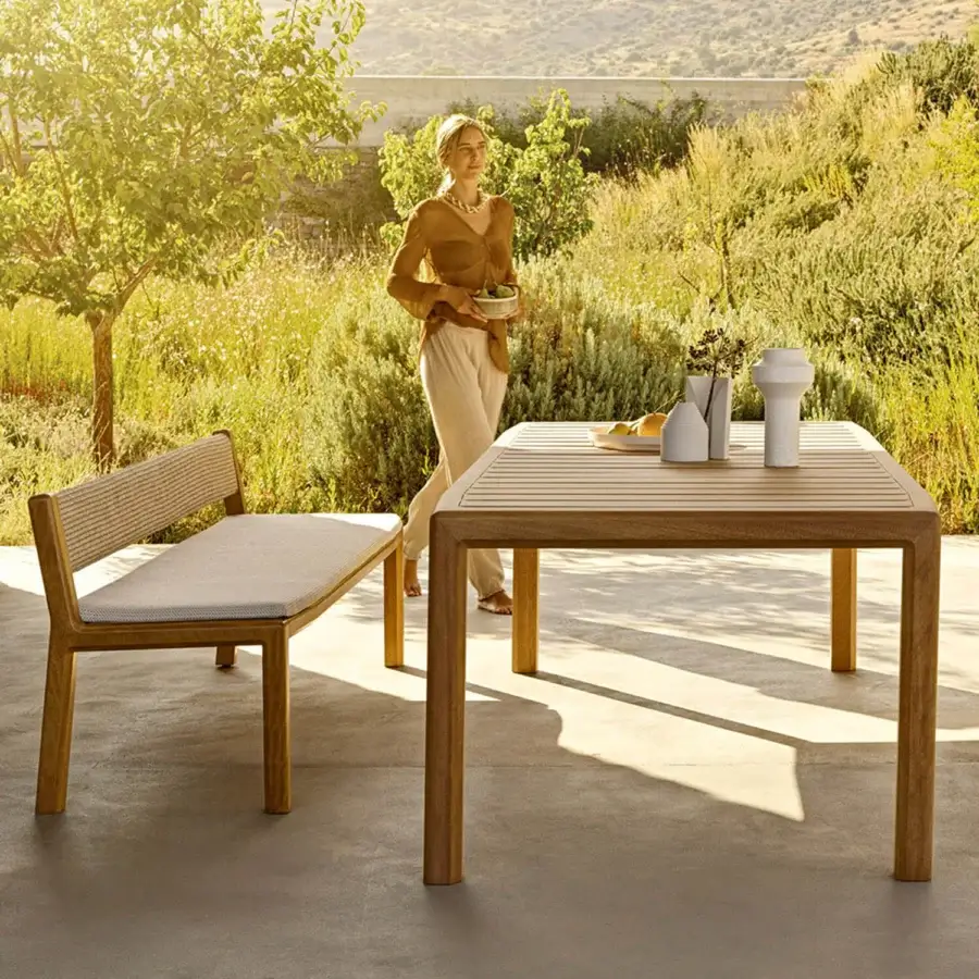 Distinguished Varaschin Gianna dining table crafted in Iroko wood with a satin finish and minimalist slat design