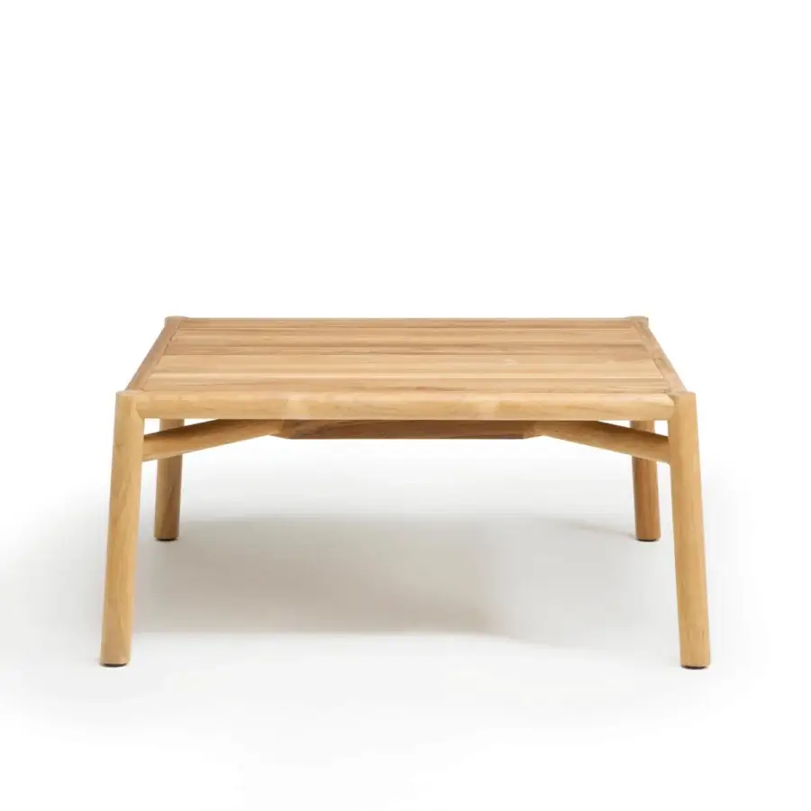 Distinguished Ethimo Kilt coffee table crafted in warm light brown teak with a smooth satin finish