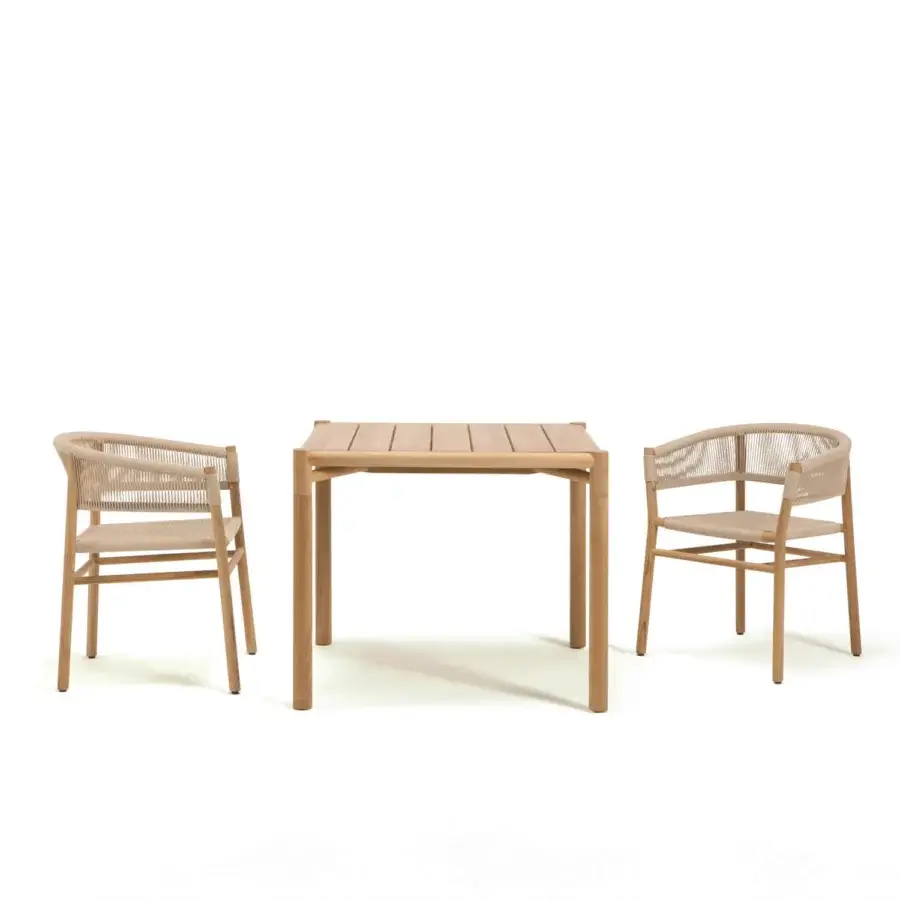 Exceptional Ethimo Kilt table crafted from FSC-certified teak with a smooth satin finish and woven chair backs