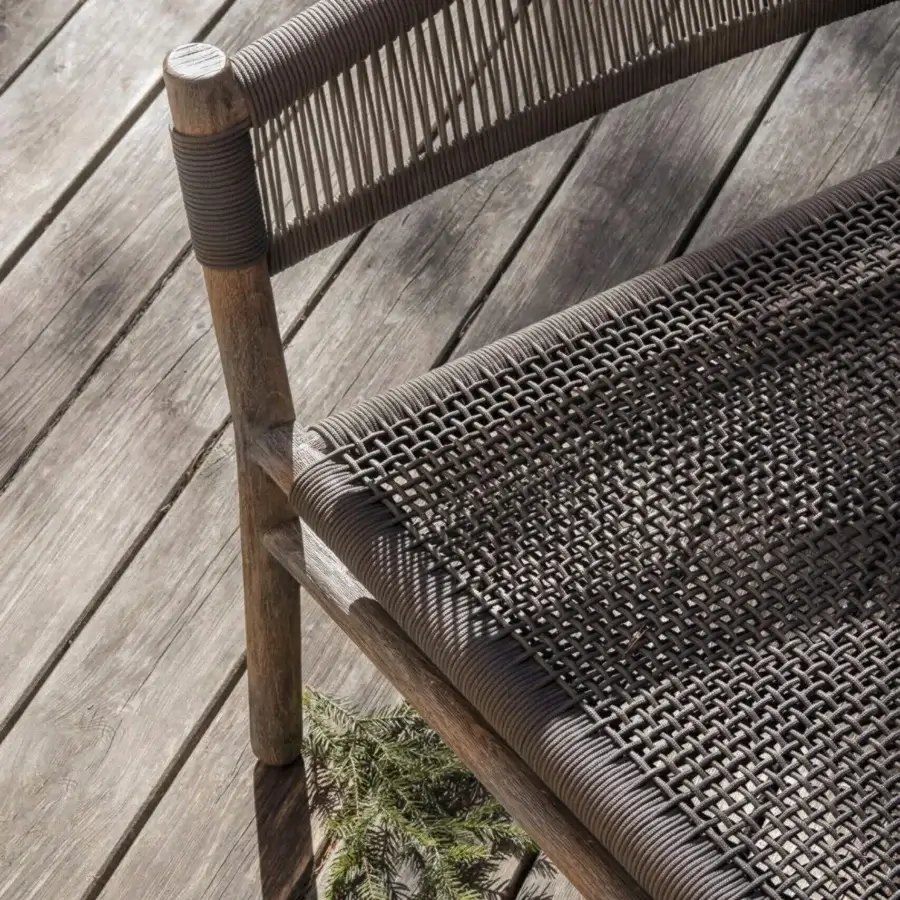 Exceptional Ethimo Kilt lounge chair crafted in dark brown teak with a durable natural fibre weave