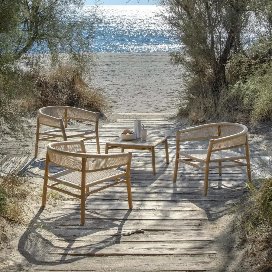 Exceptional Ethimo Kilt lounge chair crafted in FSC-certified teak with a natural fibre weave and warm light brown tone