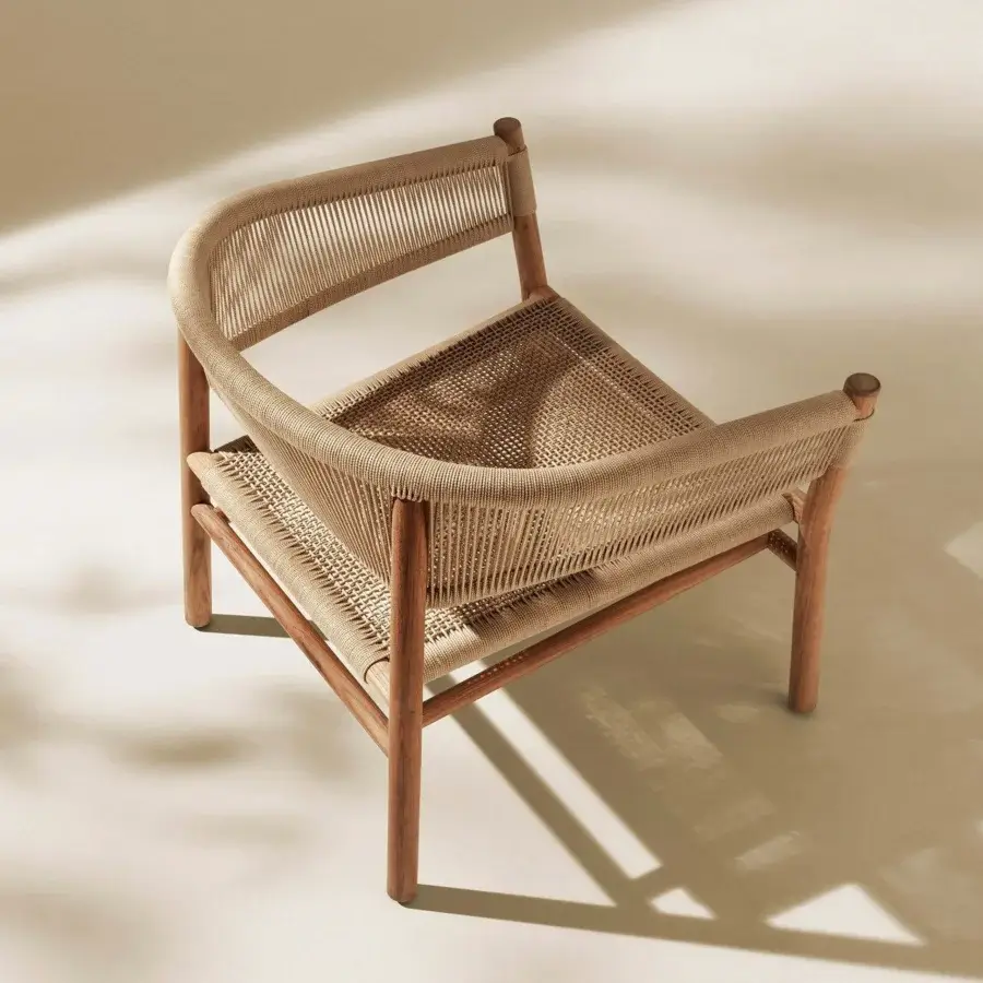 Exceptional Ethimo Kilt lounge chair crafted with FSC-certified teak and natural fiber weave in warm medium-brown tones