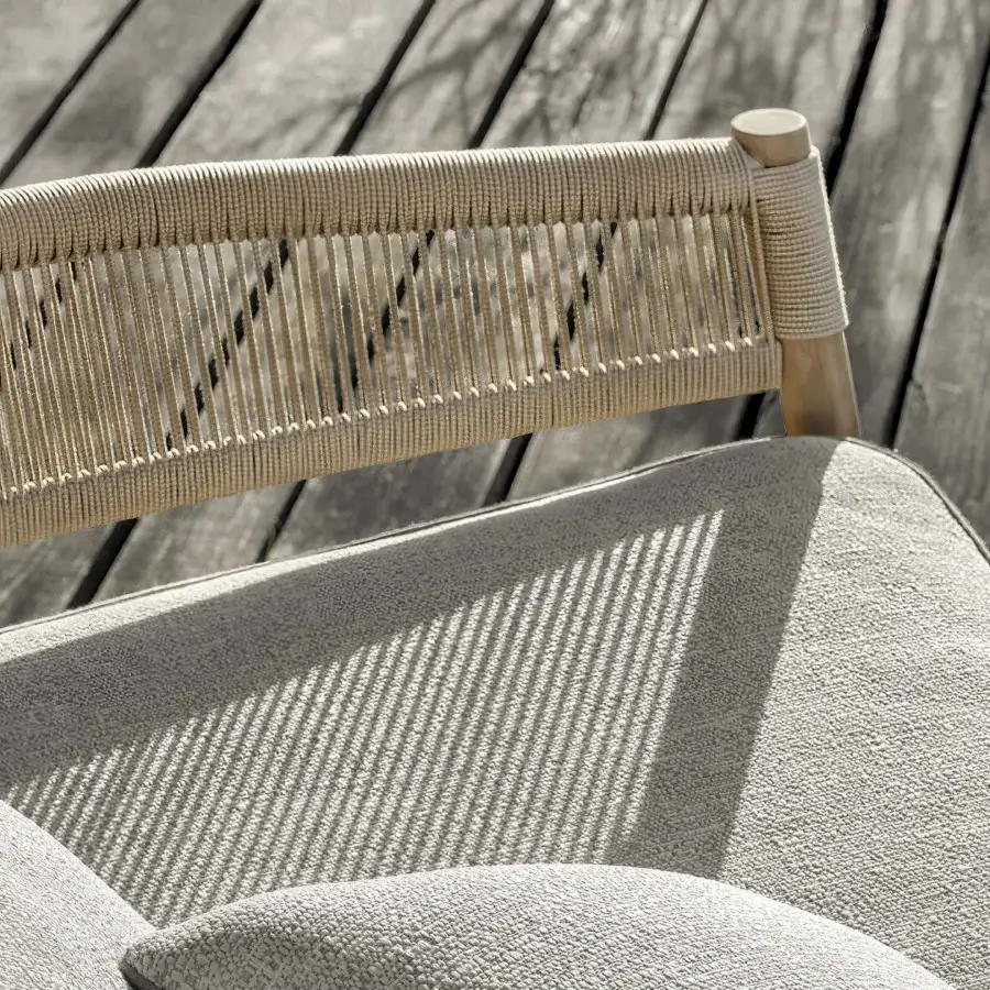 Superior Ethimo Kilt sofa with woven detailing in a neutral beige-grey palette and FSC-certified teak construction