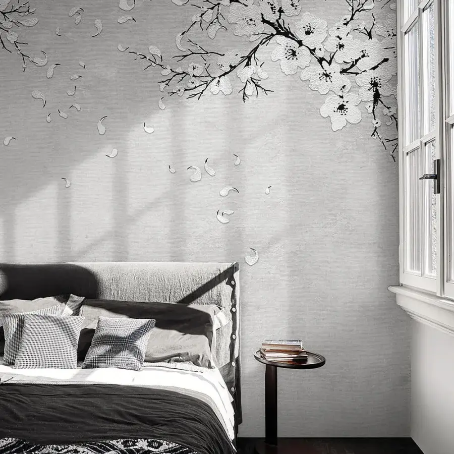 Sophisticated LondonArt Marilyn Wallpaper captures a modern garden aesthetic with stylized cherry blossom branches in a muted gray monochromatic palette and subtly textured matte finish